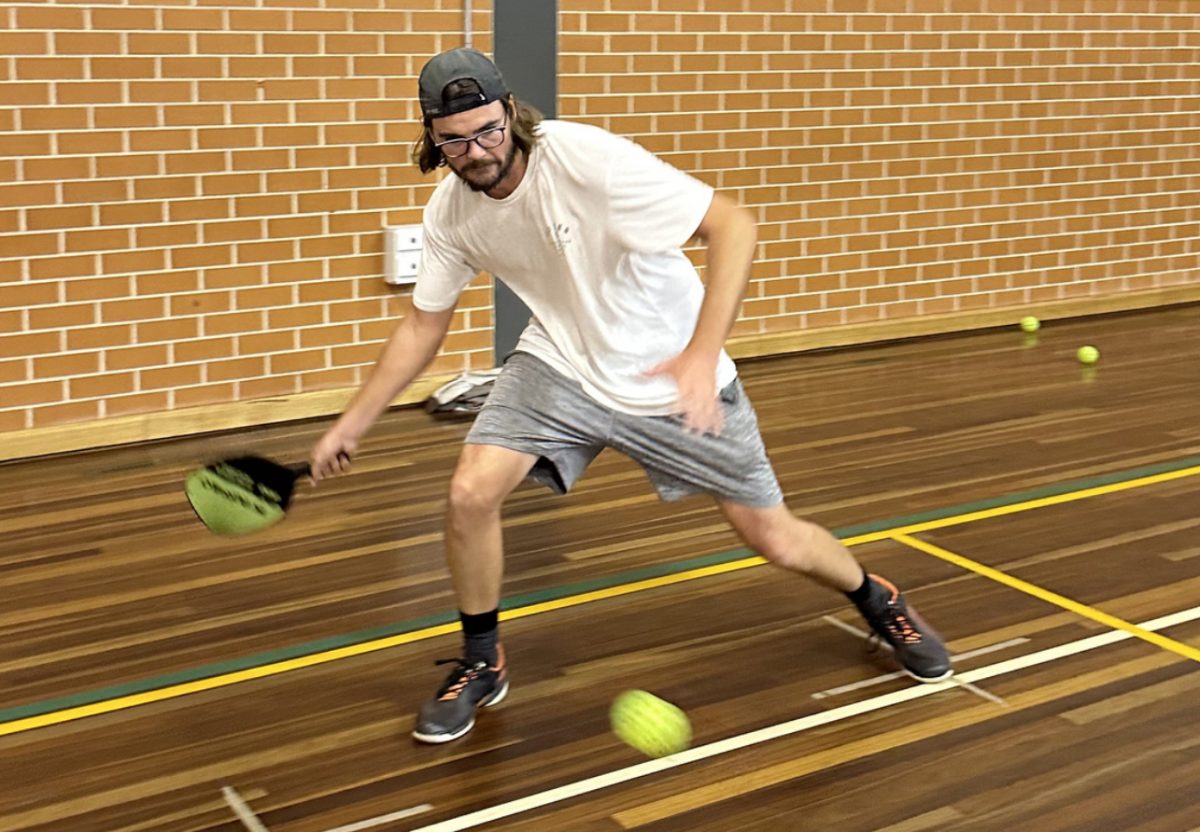 man playing pickleball