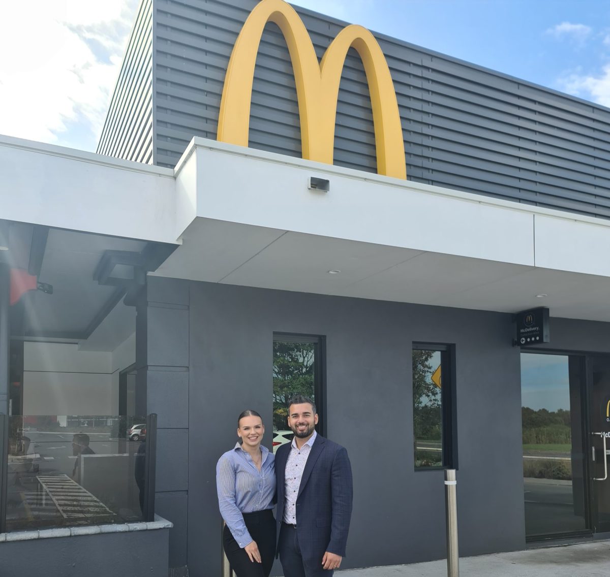 James and Sharnae Dwarte in front of McDonald's Warrawong