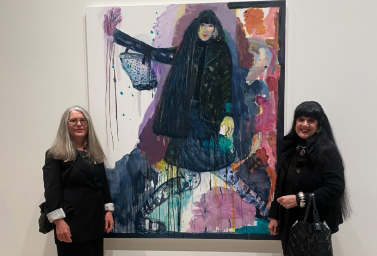 two women and a painting