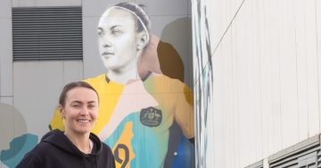 A huge star on the field, Caitlin Foord is now the star of a huge Wollongong mural, as is pet pooch Peach