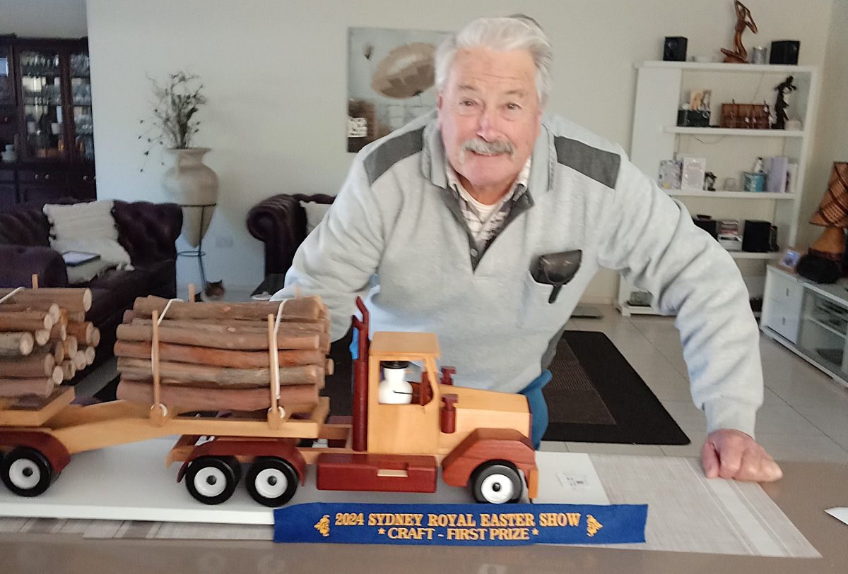 Malcolm with his timber truck.