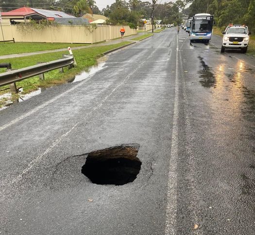 Big hole in a road.