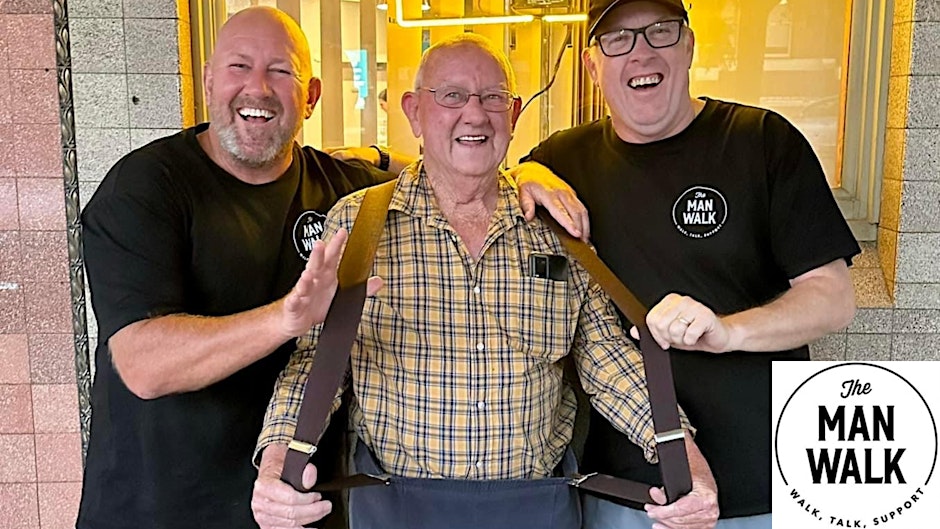 Three men smiling