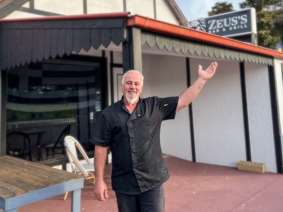 Man outside a restaurant