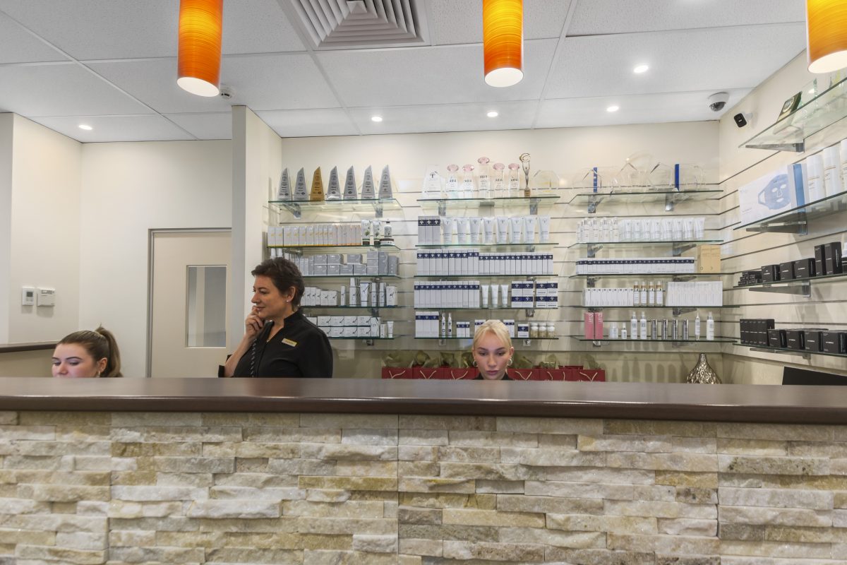 Women behind the counter at a skin clinic