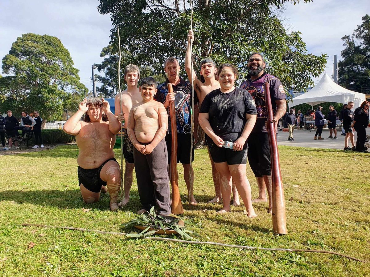 Aboriginal dancers with didgeridoos and other artefacts