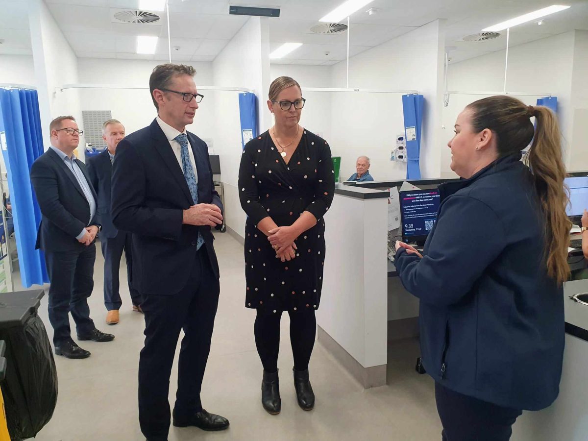 Member for Whitlam Stephen Jones and Coordinaire CEO Prudence Buist speak with practice manager Rebecca Subotic at the Dapto Medicare Urgent Care Clinic on Wednesday (17 July).