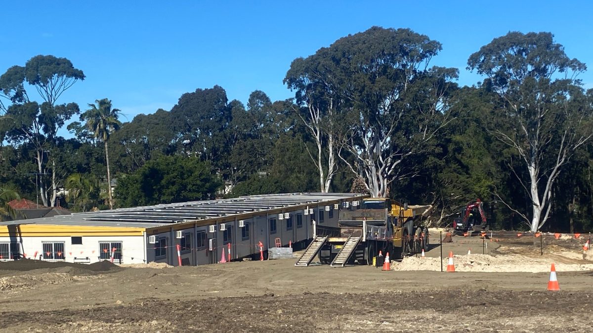 Site shed sets up for road workers.