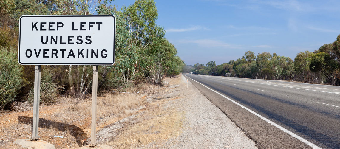 Sign next to road