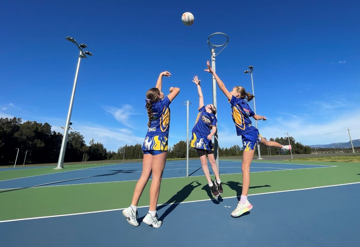 Netballers training on a court