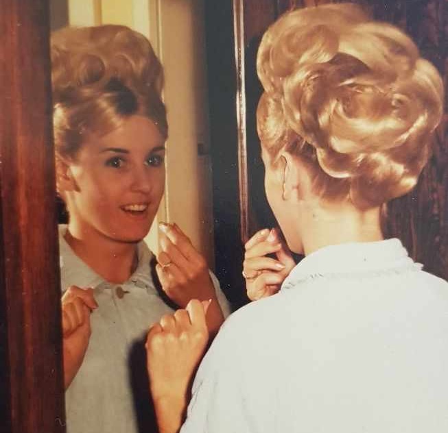 A young woman gets ready for her debutante ball