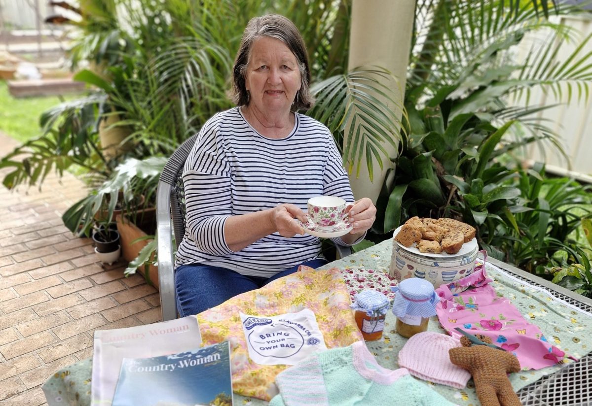 Woman having a cuppa.