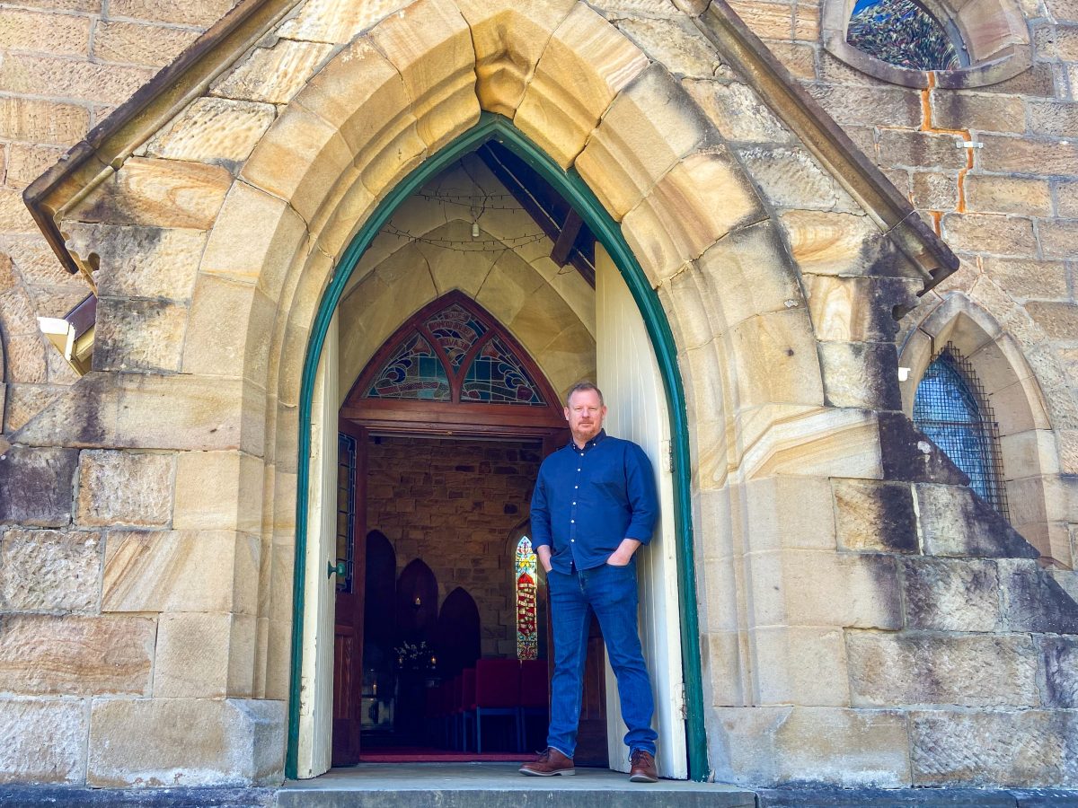 Northern Illawarra Uniting Church minister Josh McPaul outside the church