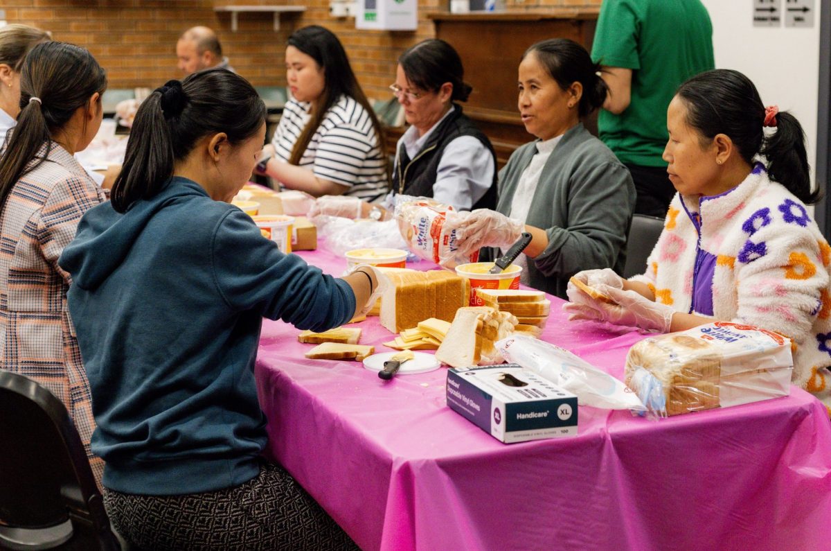 Volunteers make sandwiches for Eat Up