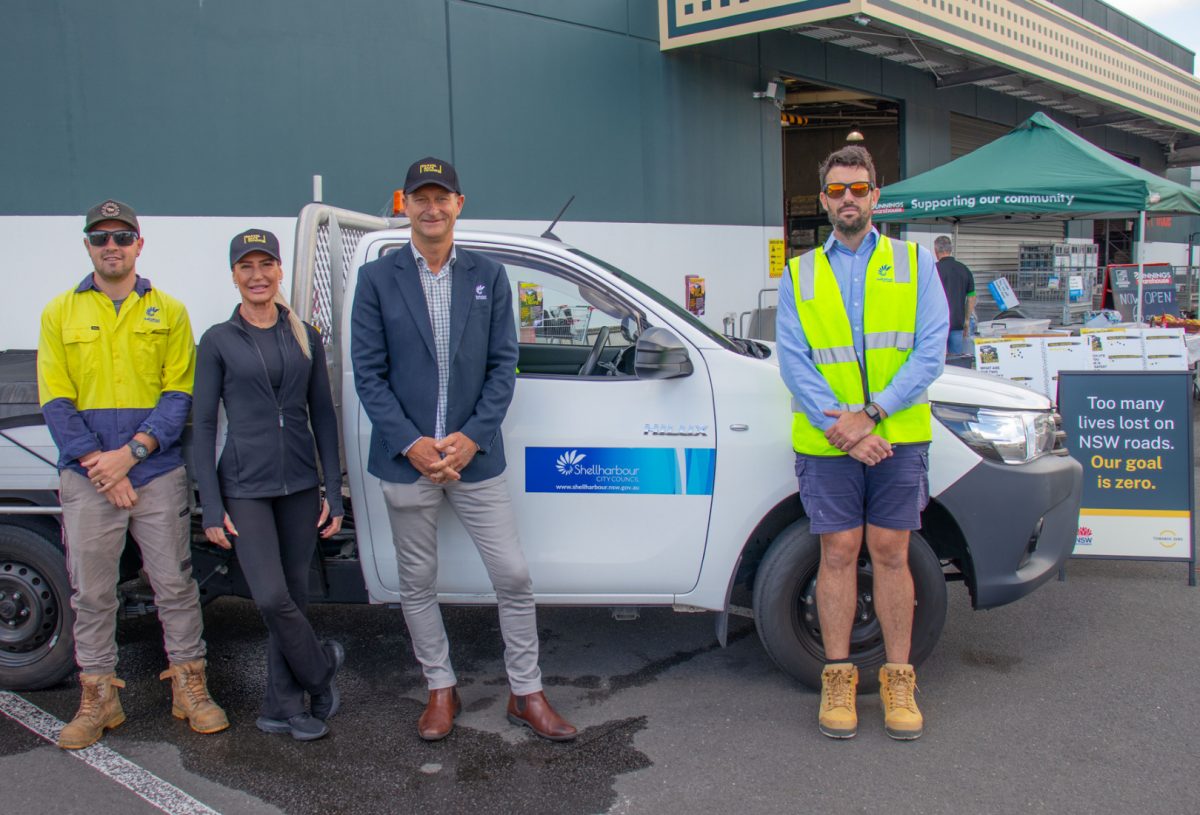 three men, a woman and a ute