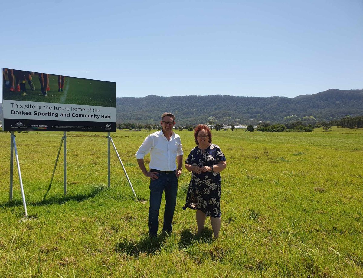 a man and a woman at a development site