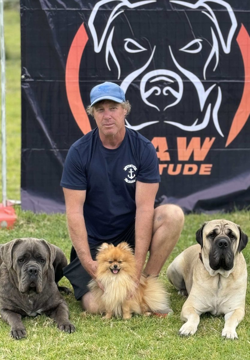 Paw Attitude owner John Egliens with some of the breeds he works with. Photo: Supplied.