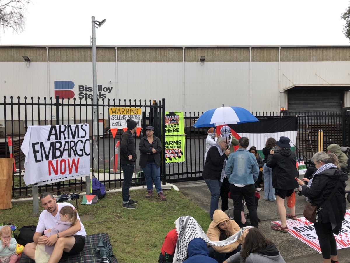 Wet weather didn't stop picketers outside Bisalloy Steel in Unanderra on Friday (15 November).