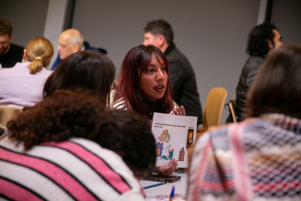 Woman at a table with other people