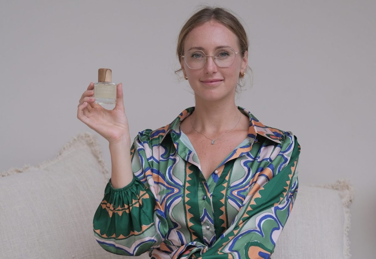 Katie Buchhorn holds a perfume