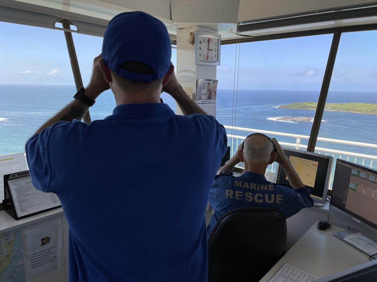 A kayaker whose craft had overturned in windy conditions off Big Island was rescued thanks to the keen eyes of a Port Kembla Marine Rescue volunteer a kayaker. 