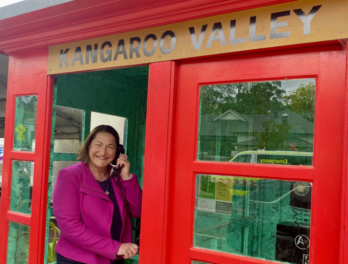 Woman in a phone box