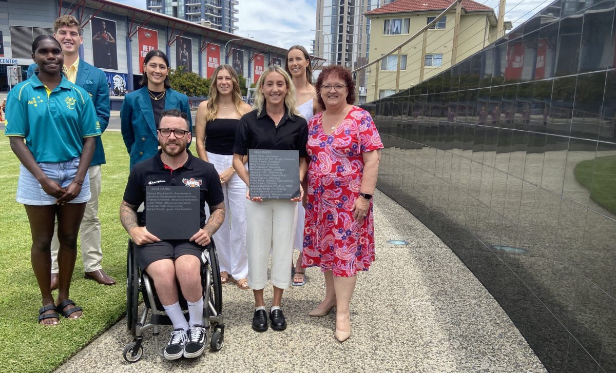 Telaya Blacksmith, Brendon Smith, Saya Sakakibara, Luke Pople, Ellen Perez, Sarah Carli, and Emma McKeon with Lord Mayor of Wollongong Tania Brown at the unveiling of new tiles for the Illawarra Olympic and Paralympic Tribute Wall