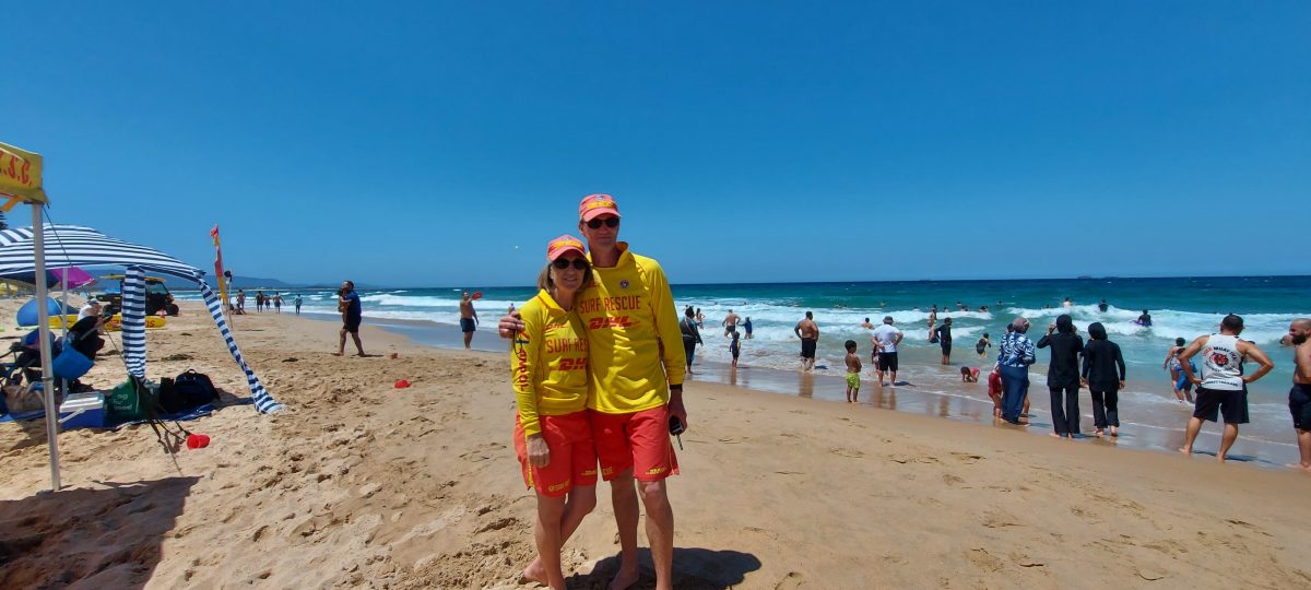 Two lifesavers on a beach