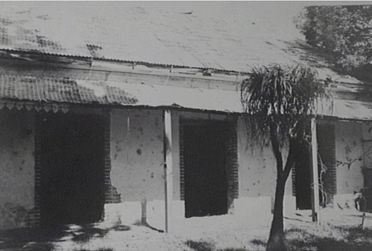 Black and white photo of old house