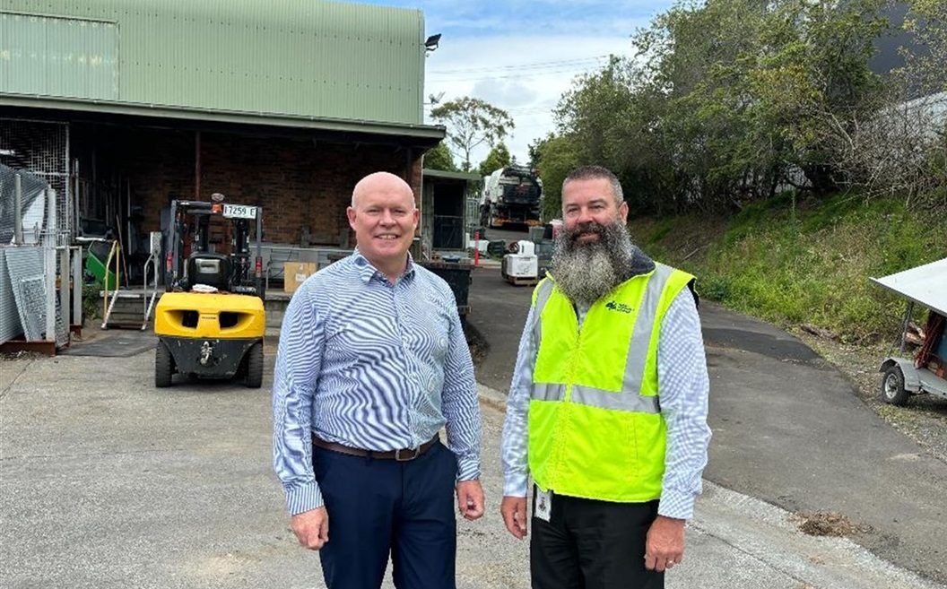 Two men at a works depot