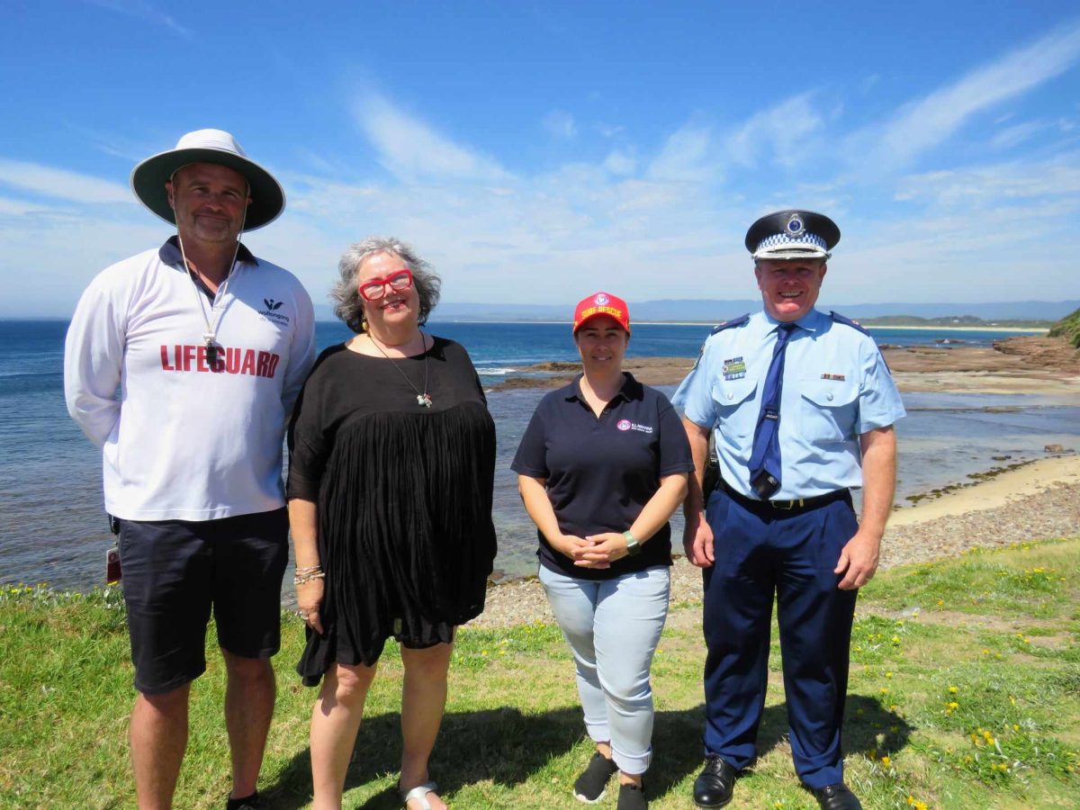 Wollongong City Council's beach services operations manager Murray Copas, Councillor Ann Martin, Surf Life Saving Illawarra director Jackie Percy and Superintendent of Lake Illawarra Police Craig Ireland at the popular rock fishing spot Hill 60, Port Kembla. 