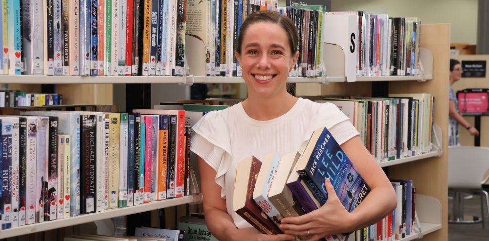 woman holding books