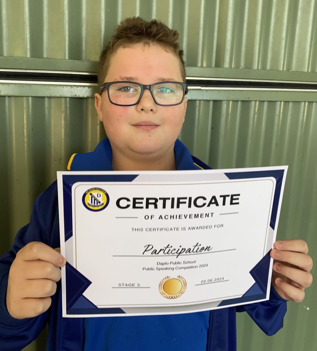 Boy holding a certificate