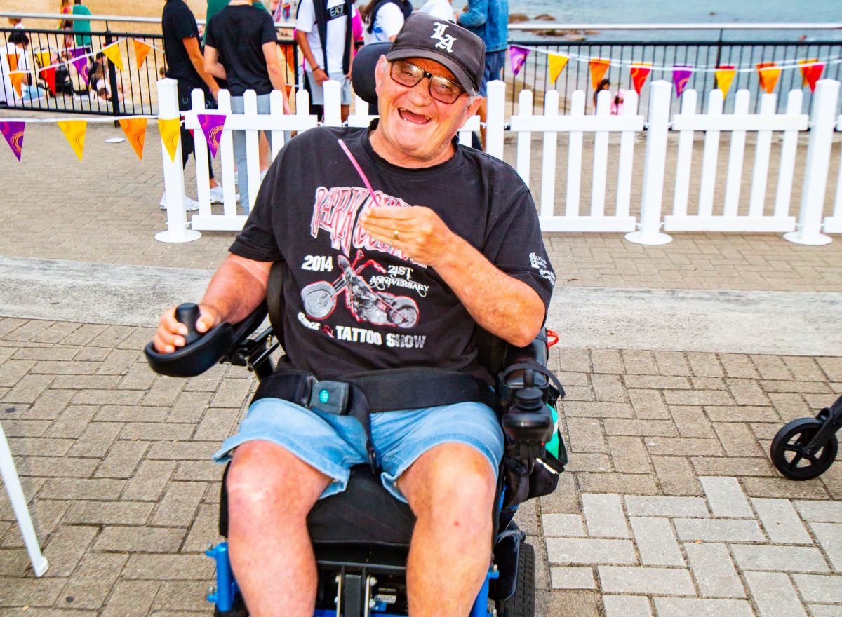 A person with disability uses the Accessible Viewing Area at New Year's Eve celebrations in Wollongong