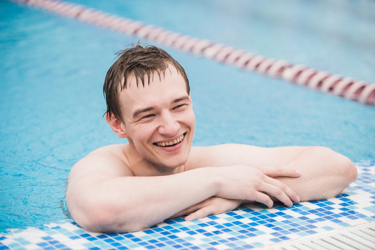 Young man in swimming pool