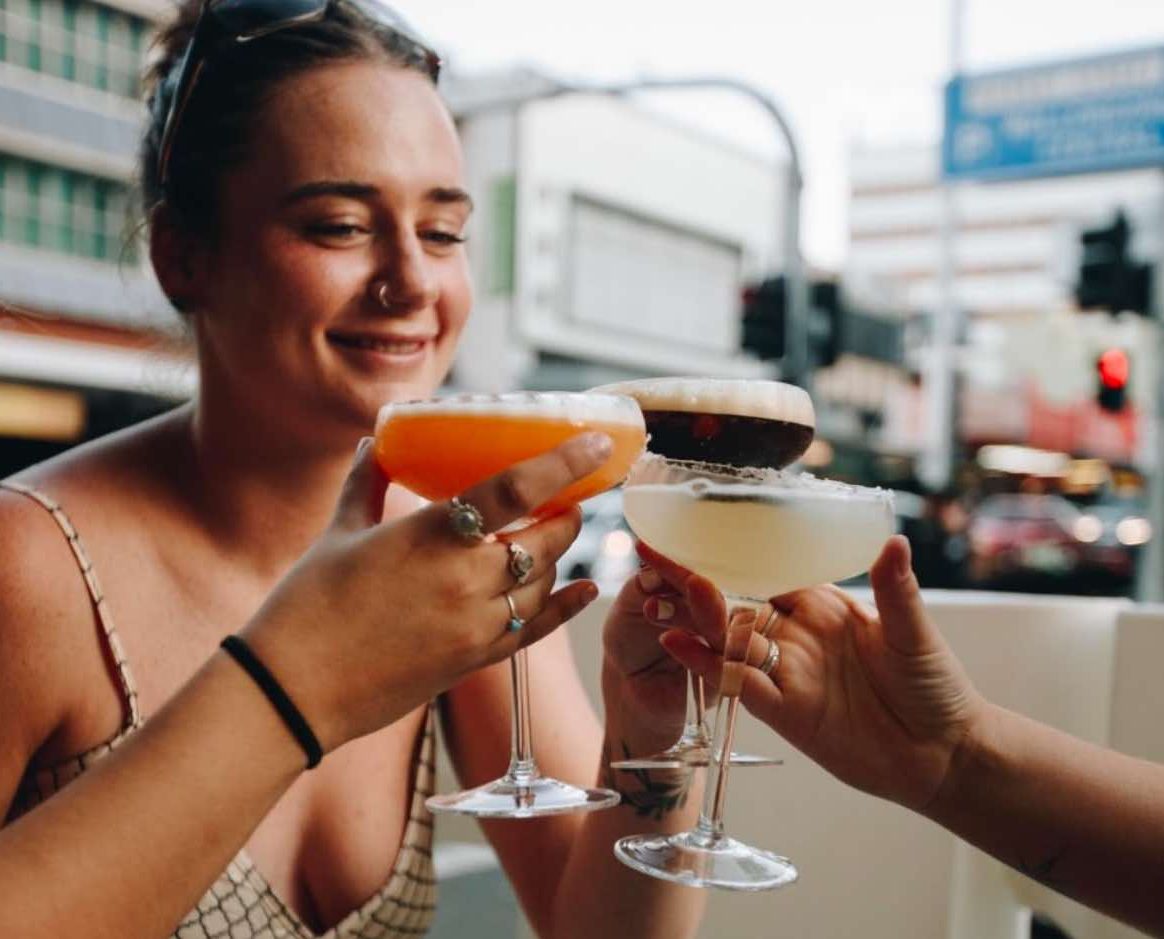 People drinking cocktails.