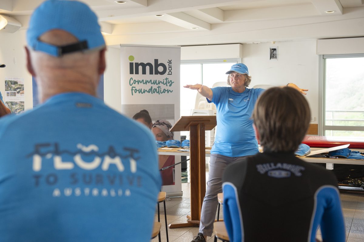 Former Olympian Shane Gould gives a talk at the launch of the Float to Survive campaign at the Sandon Point Surf Life Saving Club