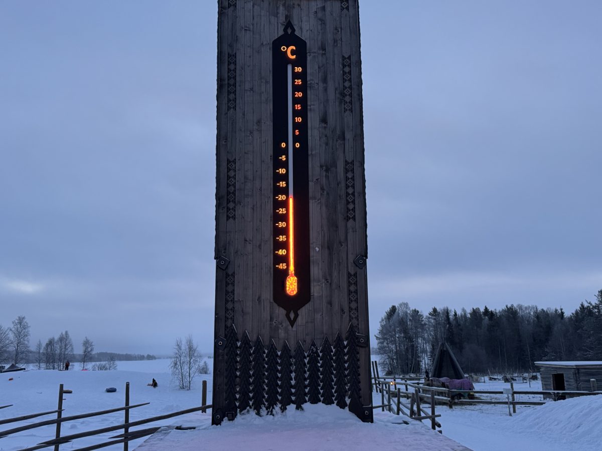 a giant temperature gauge in the snow