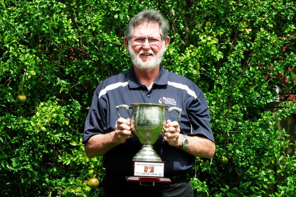 Man with trophy