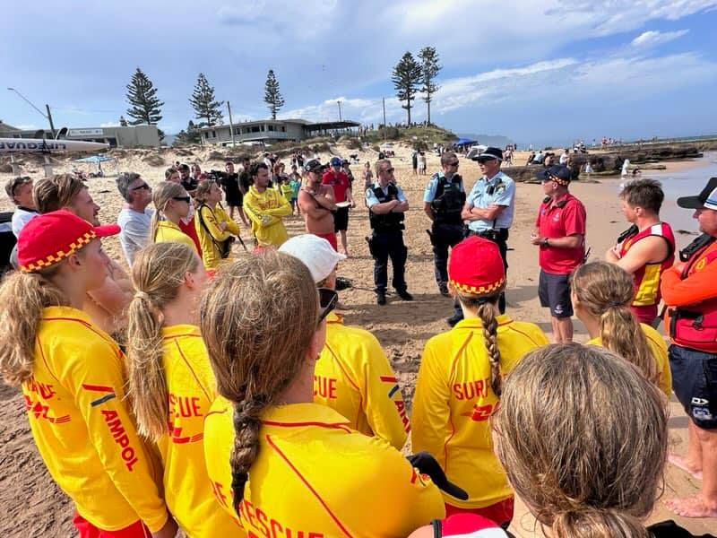 Lifesavers and police at Bulli Beach.