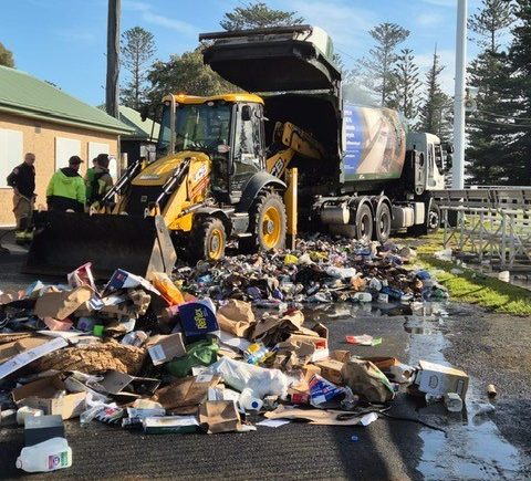 Dumped garbage truck fire debris 