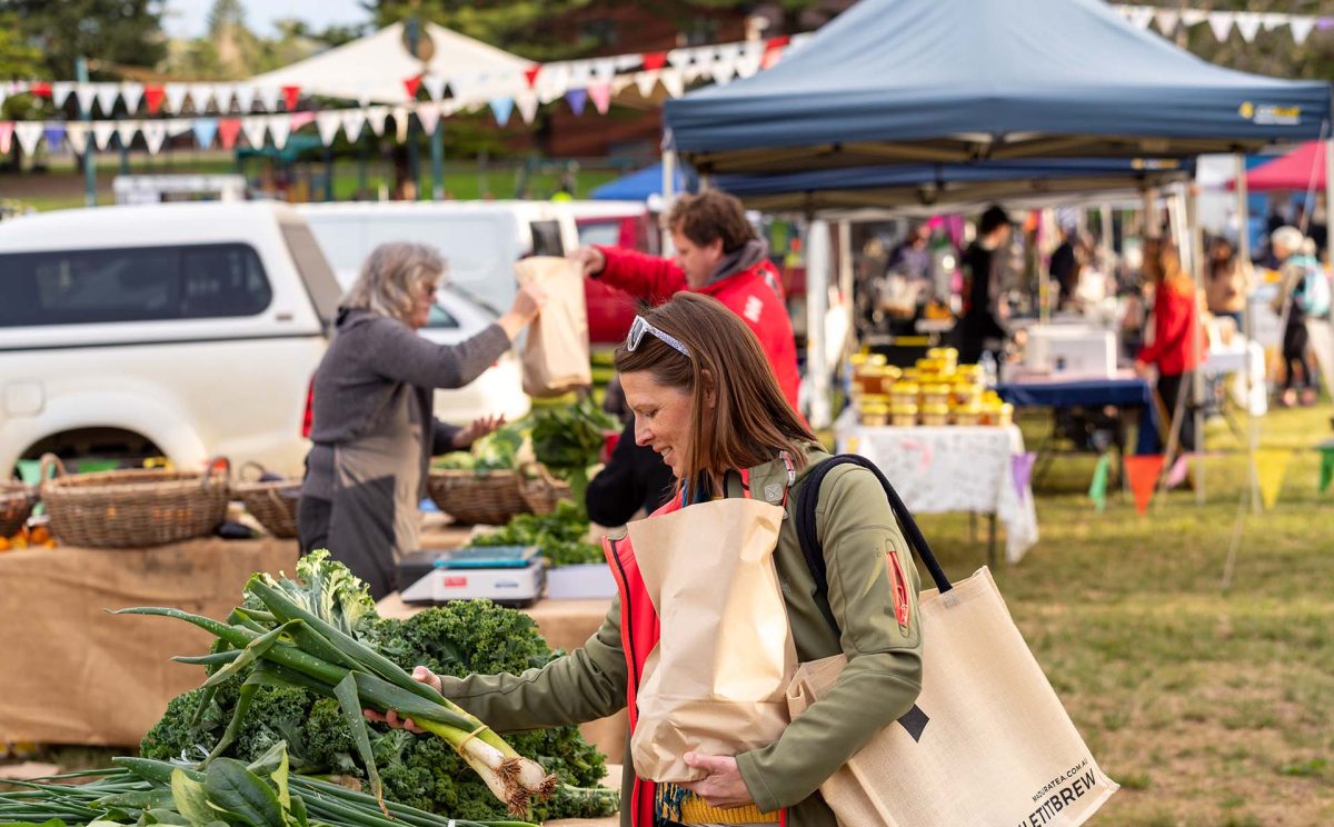 Woman shops at Kiama Farmers Market