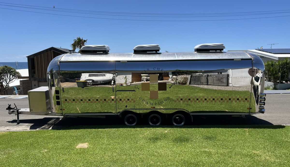 Skin Check Champions' mobile skin check airstream parked on the road