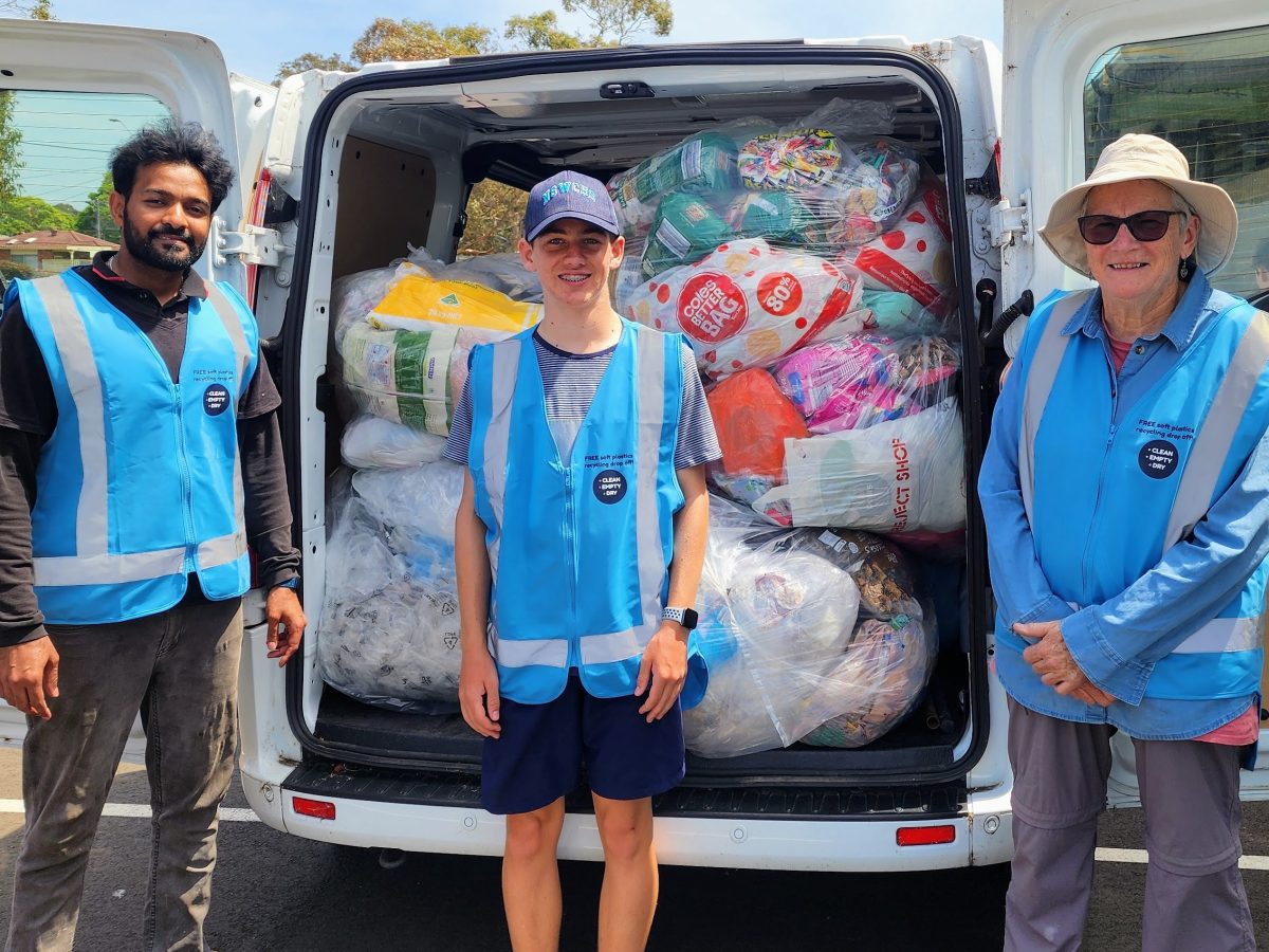 three people with van full of rubbish bags