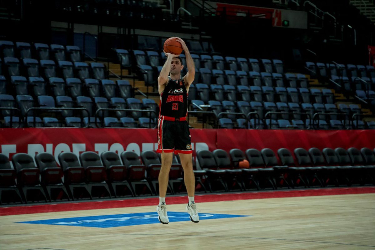 Man shooting basketball