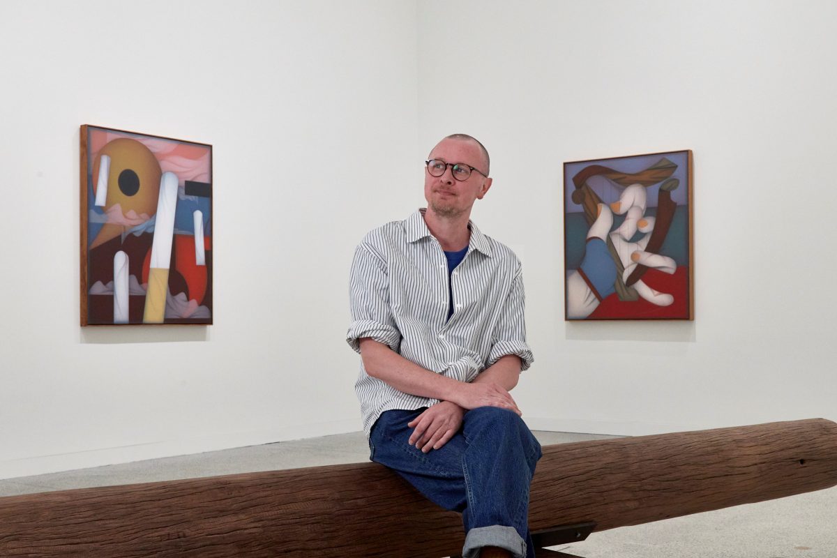 Artist Mitch Cairns and a couple of the works from his Restless Legs exhibition at the Art Gallery of New South Wales.