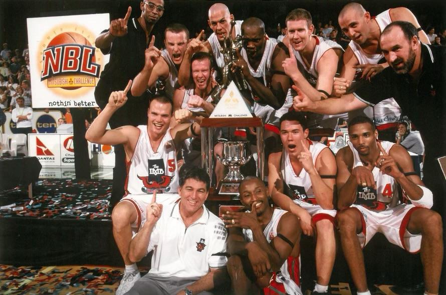 Brendan Joyce (bottom row left) with the team he coached to claim the Hawks' one and only NBL Championship.