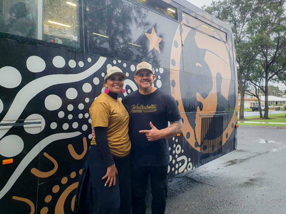 COORDINARE's Aboriginal health consultant, Taneka Longbottom and Brian Dowd, the Walkabout Barber at Lakeside Reserve, Koonawarra.