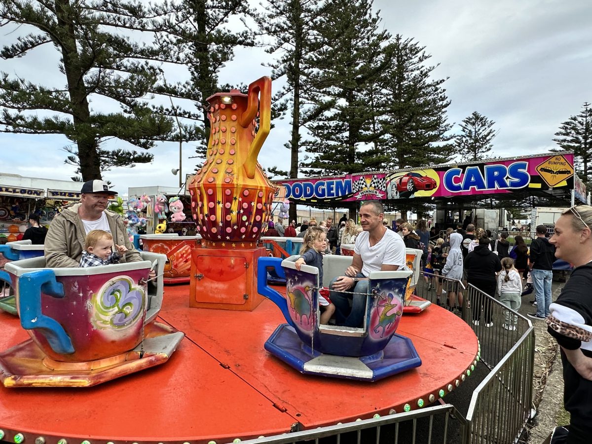 People enjoy carnival rides