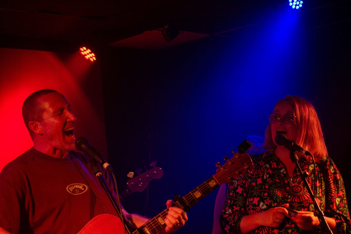 Kenny and Amanda Bartley take to the stage with their band The Midnight Feast at the 2024 Beats for the Blues festival in Port Kembla. Photo
